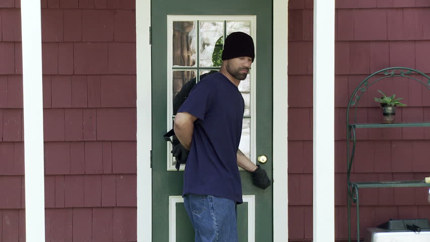 Burglar makes his way up to a house door, finds it unlocked and makes his way