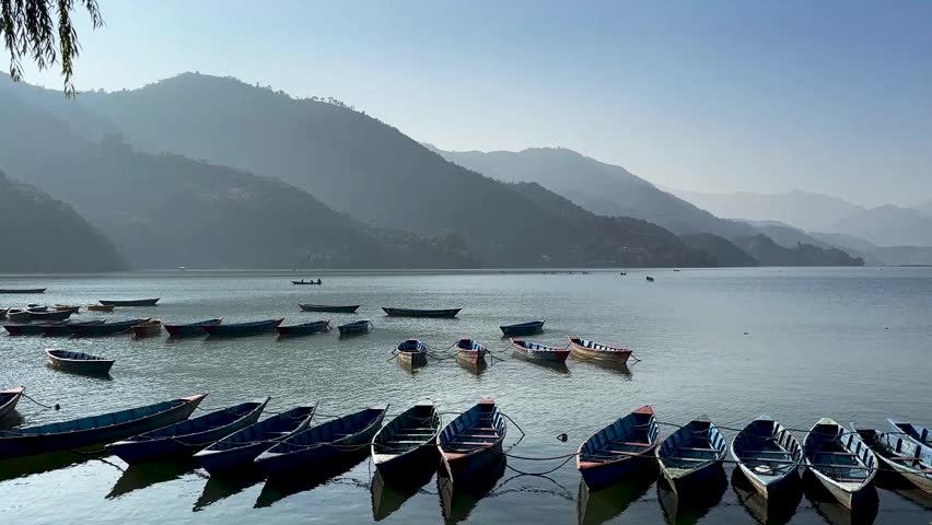 Landscape view of Phewa lake during sunset in Pokhara, Nepal.