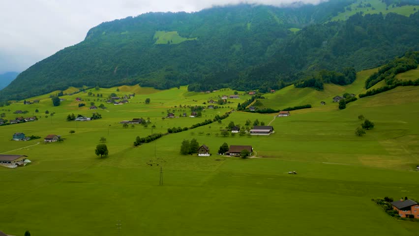 4K Drone Video of Quaint Homes at the base of Stanserhorn Mountain in Stans, Switzerland