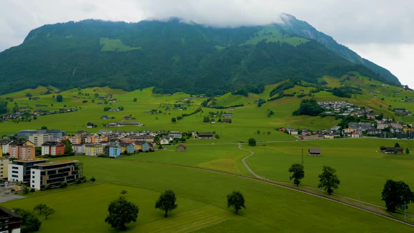 4K Drone Video of Farmland at the base of Stanserhorn Mountain in Stans, Switzerland