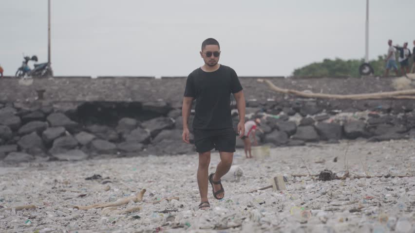 Ocean Plastic Waste Pollution, Dirty Polluted Trash Beach in Kedonganan Bali Indonesia Environmental Crisis