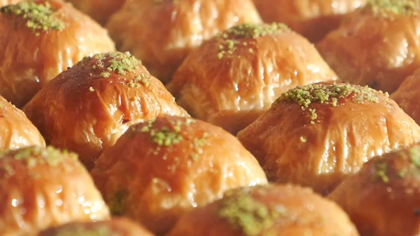 Enjoy the mouthwatering and delicious Baklava Slices that come with a delightful Pistachio Topping