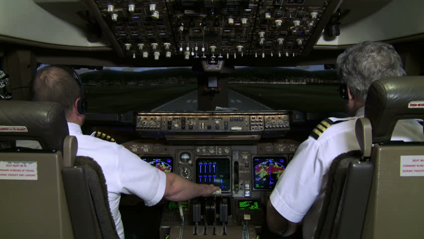 Pilots take off in a jumbo jet.