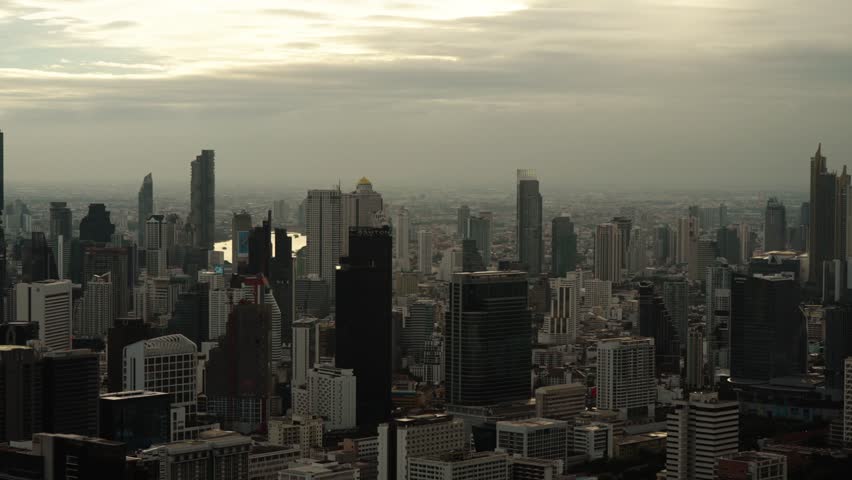 Bangkok , Thailand - 01 22 2025: Towering Buildings In The City Of Bangkok At Dawn In Thailand. Aerial Shot