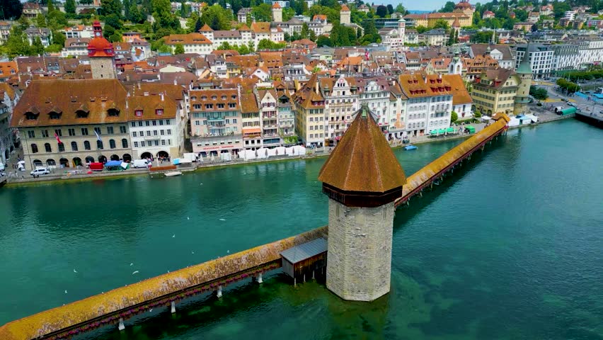 4K Drone Video of the Chapel Bridge on the Reuss River in the Old Town of Lucerne, Switzerland