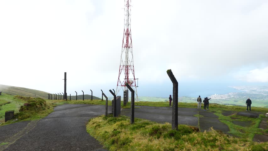 Road leading up to scenic view pointon the Azores island, Portugal, misty view point, hiking routes.