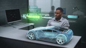 African American Automotive Engineer Uses Augmented Reality Hologram to Construct 3D Model of High-Tech Electric Vehicle on Li-Ion Battery. Renewable Energy Car Design. Artificial Intelligence Concept - Powered by Shutterstock - Get 15% off with code: PIKWIZARD15