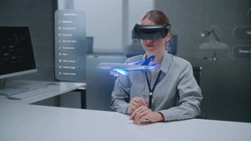 Female Engineer Uses Augmented Reality Headset to Develop 3D Holographic Model of Airplane Clean Green Energy Engine. VFX Graphics of Virtual Software User Interface Based on Artificial Intelligence. - Powered by Shutterstock - Get 15% off with code: PIKWIZARD15