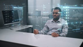 In Advanced Office: African American Specialist Uses Augmented Reality to Analyze 3D Holographic Data, Virtual Charts and Diagrams. Futuristic Data Analysis And Artificial Intelligence Integration. - Powered by Shutterstock - Get 15% off with code: PIKWIZARD15
