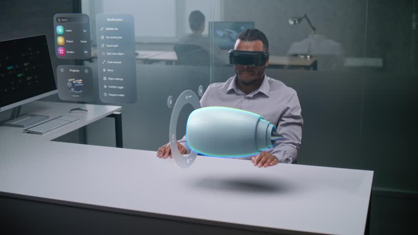 African American Engineer Uses Augmented Reality Headset to Visualize 3D Holographic Model of Renewable Energy Engine. Virtual Visualization of Design Software Based on Artificial Intelligence. - Powered by Shutterstock - Get 15% off with code: PIKWIZARD15