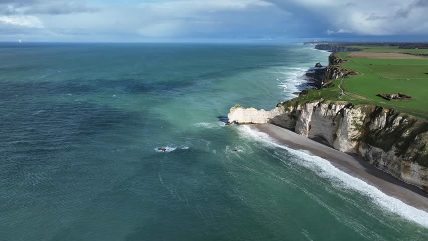 Aerial view over the coastline of the Etretat, France. A picturesque place on the shores of the Atlantic Ocean. English channel.