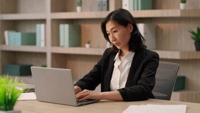 Tired Asian businesswoman sedentary computer work at office desk exhausted korean chinese girl japanese business woman feel ache neck suffer pain spine muscles backache health problem overwork laptop - Powered by Shutterstock - Get 15% off with code: PIKWIZARD15
