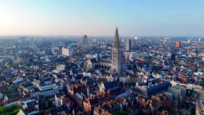 Sweeping Aerial View of the Cathedral of Our Lady Dominating the Cityscape Under a Clear Morning Sky Antwerp