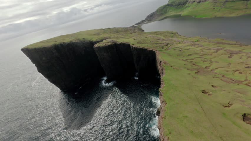 Sørvágsvatn cliffs in the faroe islands, showing nature and serenity, aerial view