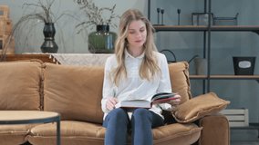 Young Woman Reading Book while Sitting in Bed - Powered by Shutterstock - Get 15% off with code: PIKWIZARD15
