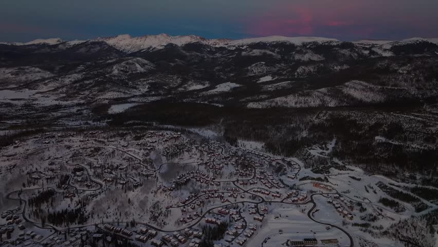 Corona Pass Blue hour Fraser Colorado aerial drone Rocky Mountains National Park Grand County neighborhood sunset sunrise Winter Park Resort village town Berthoud Pass December Winter Solstice forward