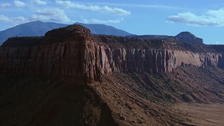 Breathtaking red cliffs under clear skies near Indian Creek, Canyonlands National Park
