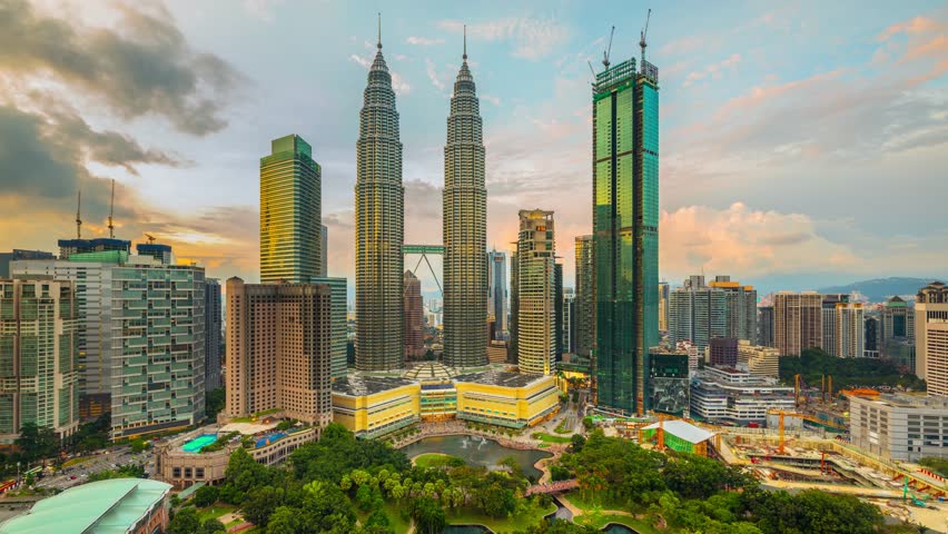 Time lapse of the skyline of Kuala Lumpur City Center in Malaysia at sunset.