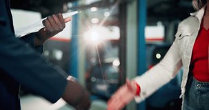 Handshake, helping people and mechanic at repair shop, price negotiation and thank you for service. Garage, maintenance and deal on motor engineering, welcome customer and meeting with clipboard - Powered by Shutterstock - Get 15% off with code: PIKWIZARD15