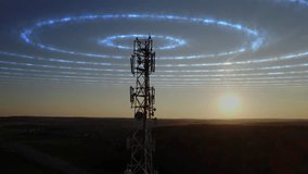 Animated rendering of radio waves transmitted by a cell phone tower. 5g technology. Aerial view of mobile communication antenna and signal spreading in all directions. High quality 4k footage - Powered by Shutterstock - Get 15% off with code: PIKWIZARD15