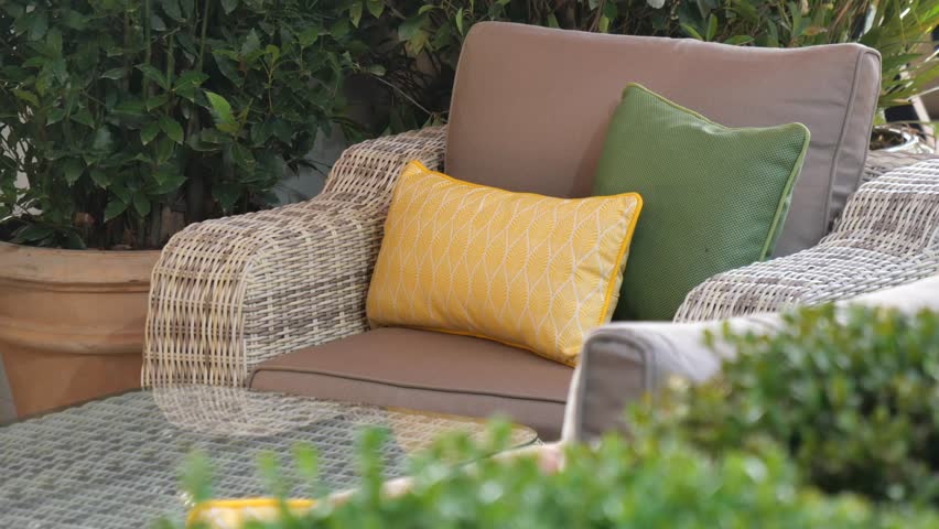 Enjoying Cozy Outdoor Seating areas adorned with Colorful Cushions