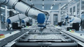Automated Robotic Arms Assembling Circuit Boards on a Conveyor. Microelectronics Manufacturing in a Modern Facility. High-Tech Technology Production in a Futuristic Industrial Environment. Zoom Out - Powered by Shutterstock - Get 15% off with code: PIKWIZARD15
