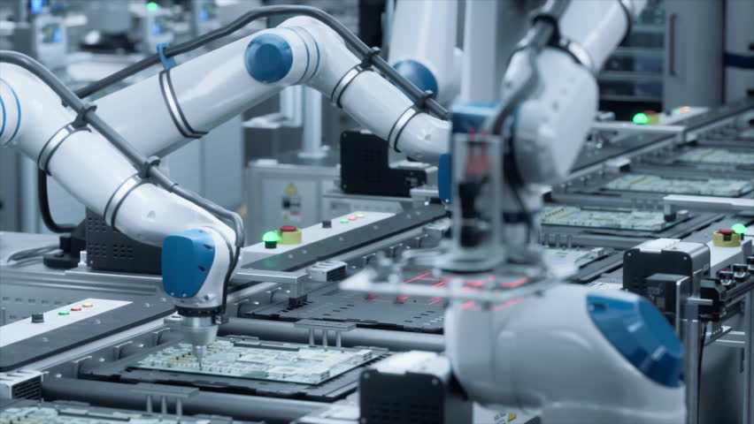 Robotic Arms Screwing Chips and Producing Electronic Circuit Boards for AI Supercomputers in Data Centers. Robotics Facility Producing Complex Microelectronic PCB Components