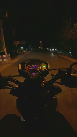 POV of Driving on a motorbike in the night