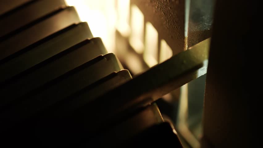 The slide changing mechanism in a 1970s projector. The operation of the mechanism causes the projector to vibrate.