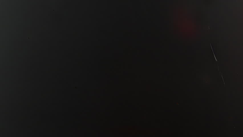 Moody dark gradient grunge background with subtle red light leak, distressed overlays, scratches, and cinematic minimal film-style abstract design