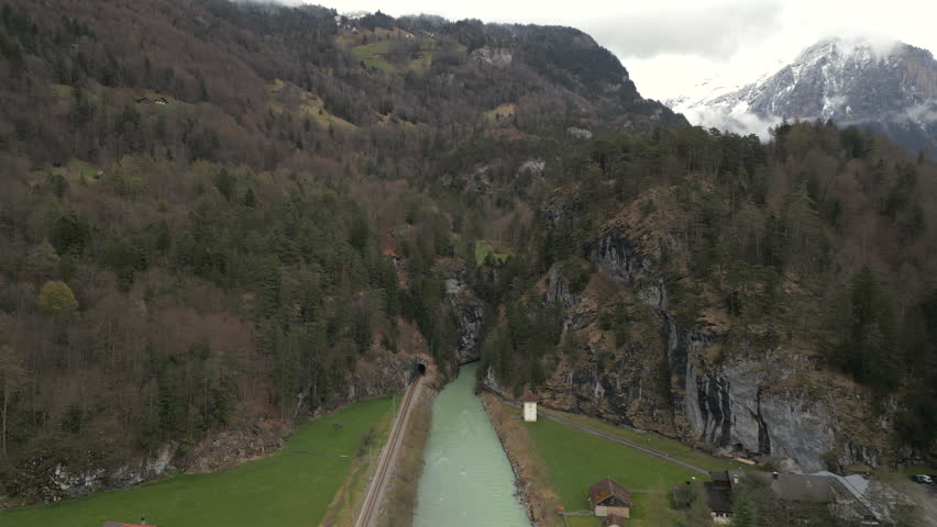 Breathtaking aerial shot of Aare Gorge in Switzerland, where natural beauty meets thrilling outdoor adventure. Dont miss this unforgettable experience amidst serene landscapes and diverse wildlife