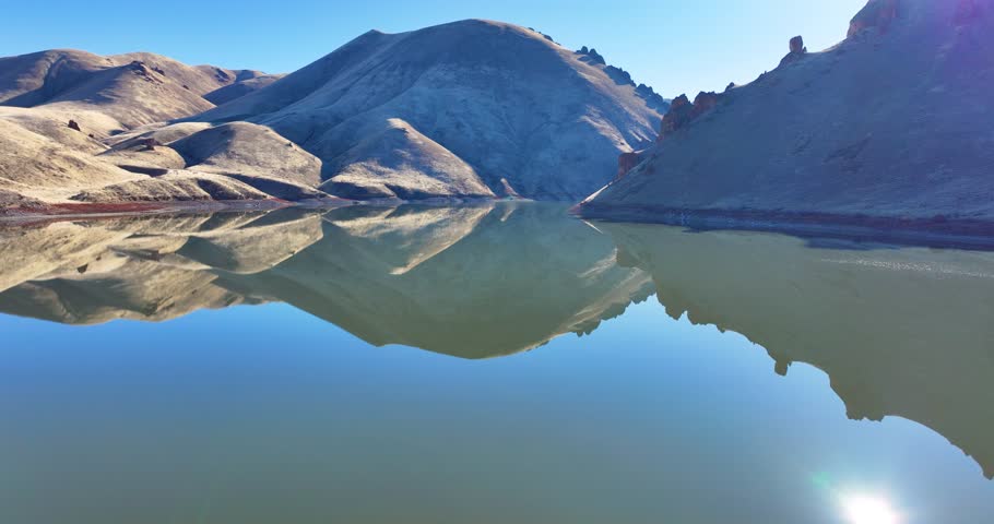 Aerial Drone Captures Towering Cliffs And Calm Waters Owyhee Lake Oregon