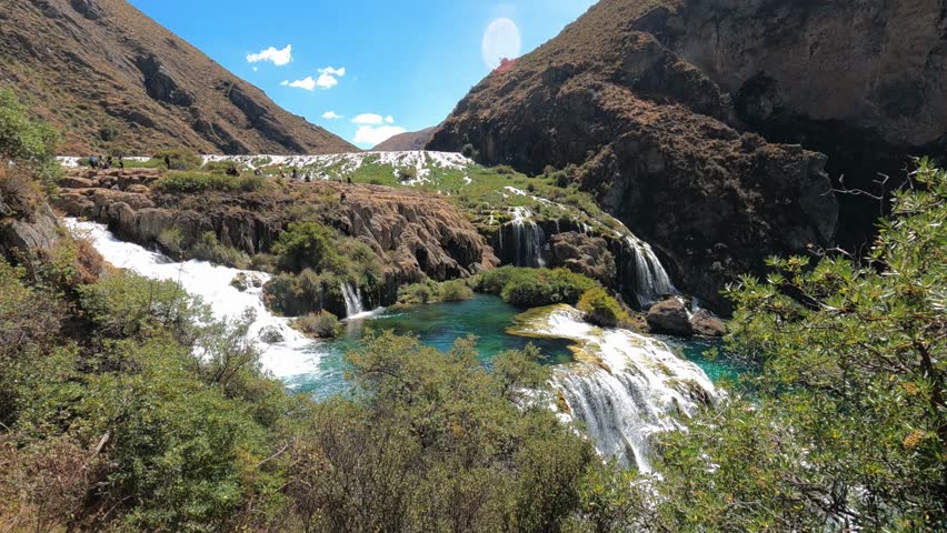 Beautiful waterfalls in the Huallhua lagoon, located in Huancaya town,  Lima Peru
