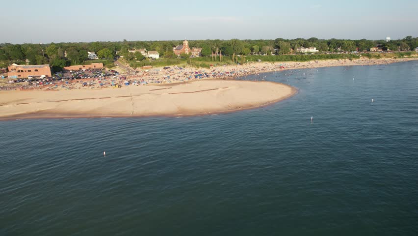 Aerial view of the beach filled with people on a hot sunny day in Lake Michigan South Heaven Michigan
