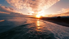 Romantic Sunset Over The Sicily Sea With Waves Crashing On The Shoreline Sunset - Powered by Shutterstock - Get 15% off with code: PIKWIZARD15