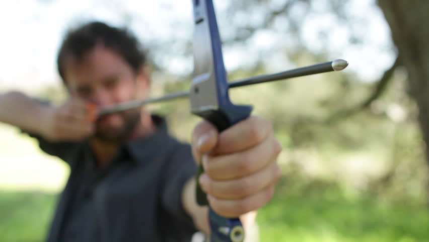 Archer viewed from the front with focus on the arrow tip. Clip doesn't change
