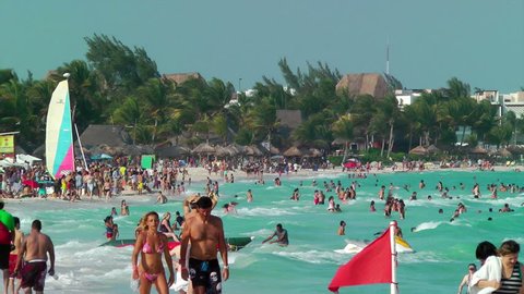 CANCUN, QUINTANA ROO, MEXICO - APRIL 20: Tourists enjoy the beach during Spring Break. This is the busiest time of the year to visit Cancun April 20, 2012