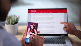 Online News And Social Media Consumption By African Couple - Powered by Shutterstock - Get 15% off with code: PIKWIZARD15