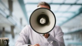 Man Making Megaphone Announcement. Warning Concept Speaker - Powered by Shutterstock - Get 15% off with code: PIKWIZARD15