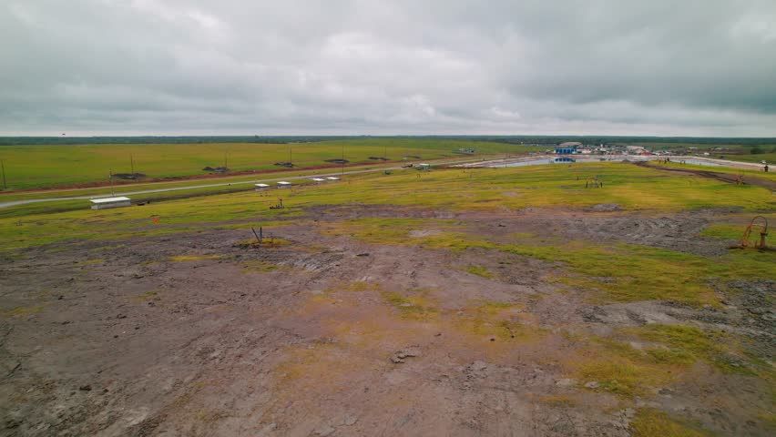 Gas wells at a large Louisiana landfill near New Orleans, highlighting methane extraction and modern waste management practices.