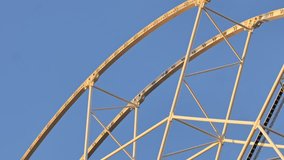 Ferris wheel structure in construction phase, elegant metal lines, blue sky, 4K - Powered by Shutterstock - Get 15% off with code: PIKWIZARD15