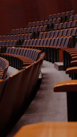 Empty seats in the hall. Rows of seats. Classroom for students. Performance Hall.