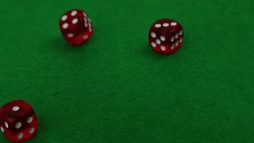  Three casino dice with winning numbers on green cloth, casino gambling, slow motion - Powered by Shutterstock - Get 15% off with code: PIKWIZARD15