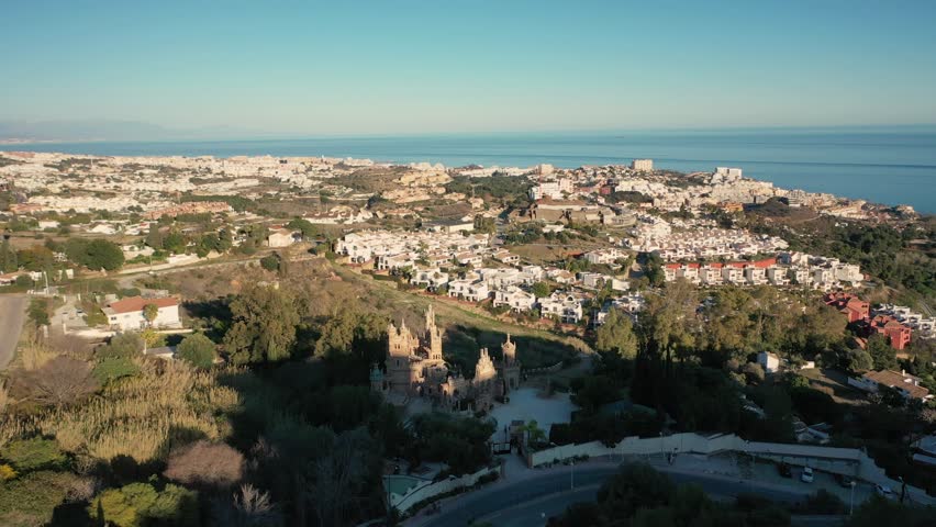Aerial 4K video from drone to Colomares Monument Castle dedicated to Christopher Columbus. Benalmadena, Malaga, Andalusia, Spain, Europe.