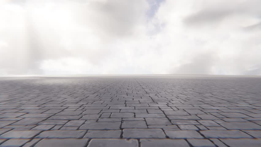 The pedestrian path on the street is paved with paving slabs. The concept of walks and recreation in the park. 4K 