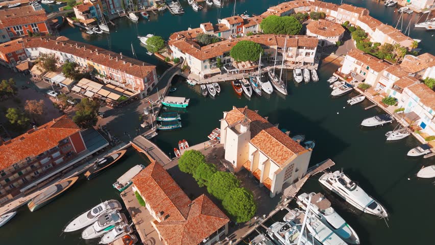 Aerial view of the Port Grimaud, Provence Alpes Cote d'Azur region in southeastern France. Beautiful marina in the French riviera. Colorful houses And boats in Port Grimaud