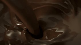 Super Slow Motion Detail Shot of Pouring Melted Chocolate at 1000fps. - Powered by Shutterstock - Get 15% off with code: PIKWIZARD15