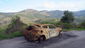 Abandoned car rusts away in scenic landscape near mountains - Powered by Shutterstock - Get 15% off with code: PIKWIZARD15