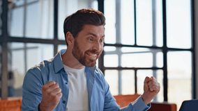 Man hands flipping business documents at work desk closeup. Successful businessman rejoicing financial win looking laptop screen in office. Emotional guy entrepreneur celebrating success at workplace - Powered by Shutterstock - Get 15% off with code: PIKWIZARD15