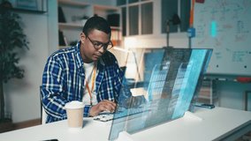 Focused IT developer works with programming code on a futuristic computer screen - Powered by Shutterstock - Get 15% off with code: PIKWIZARD15